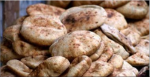 الحكومة توضح حقيقة إضافة مادة على رغيف الخبز للحد من الكثافة السكانية
